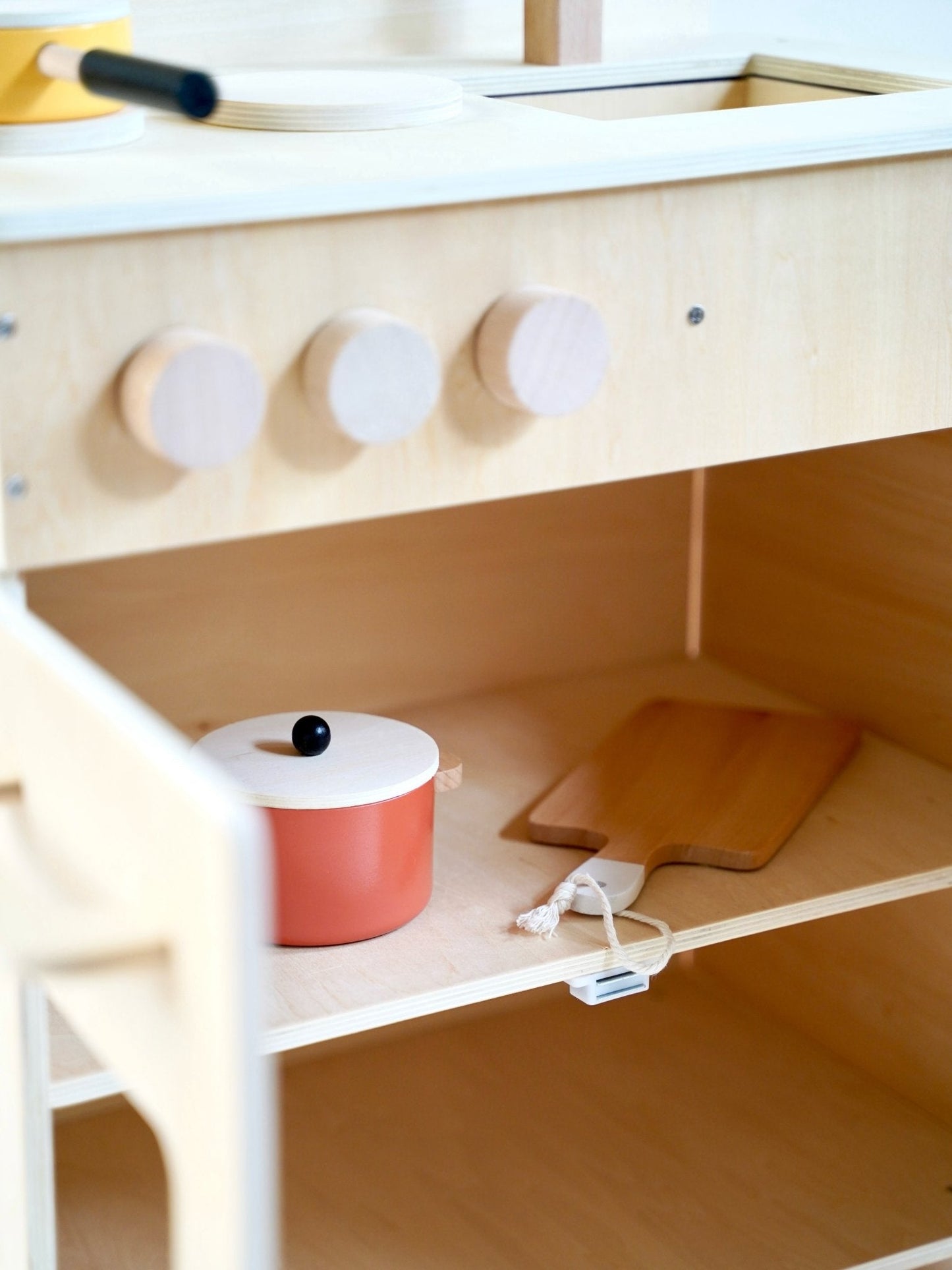 Wooden mini kitchen with cookware