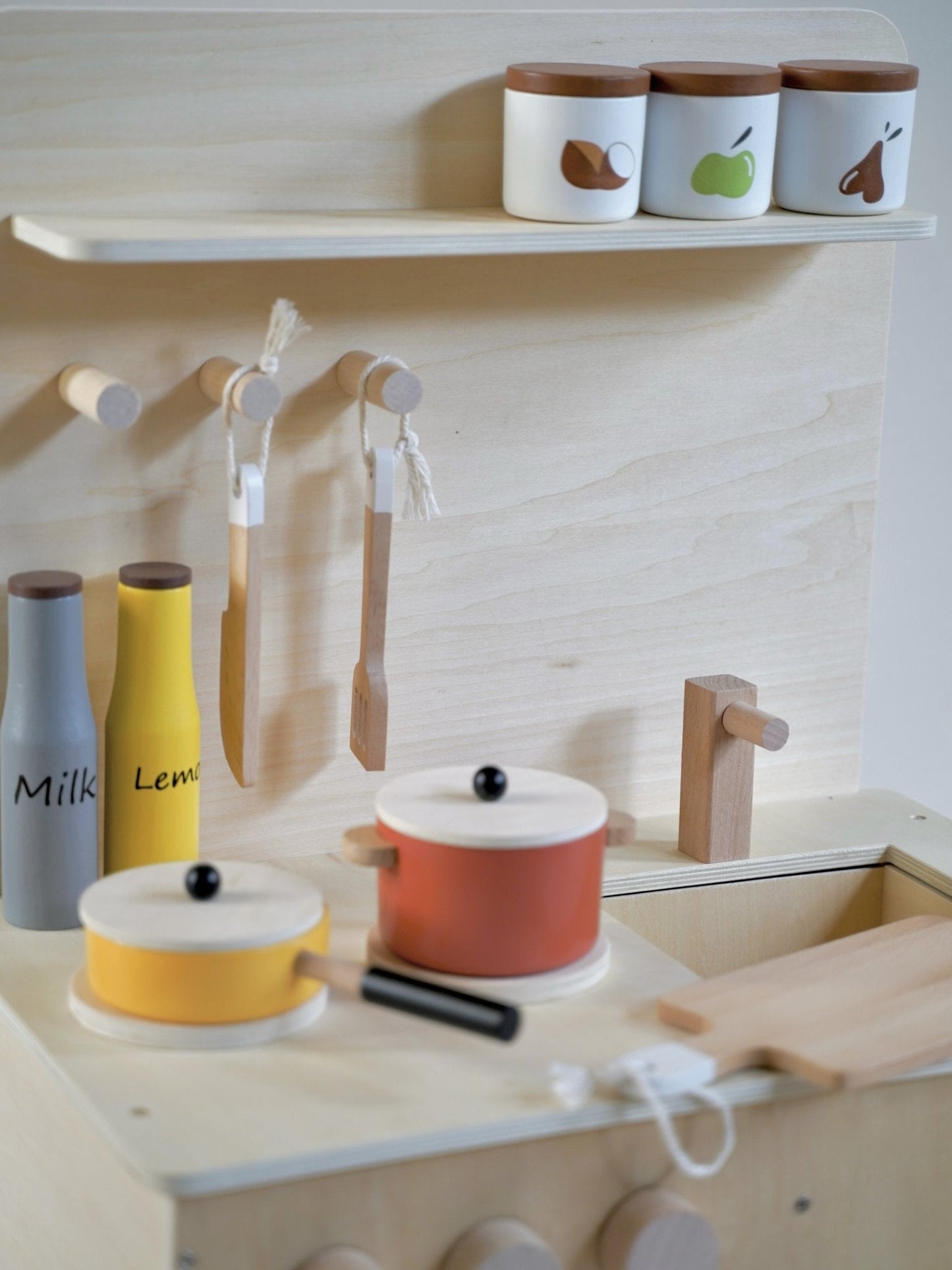 Wooden mini kitchen with cookware